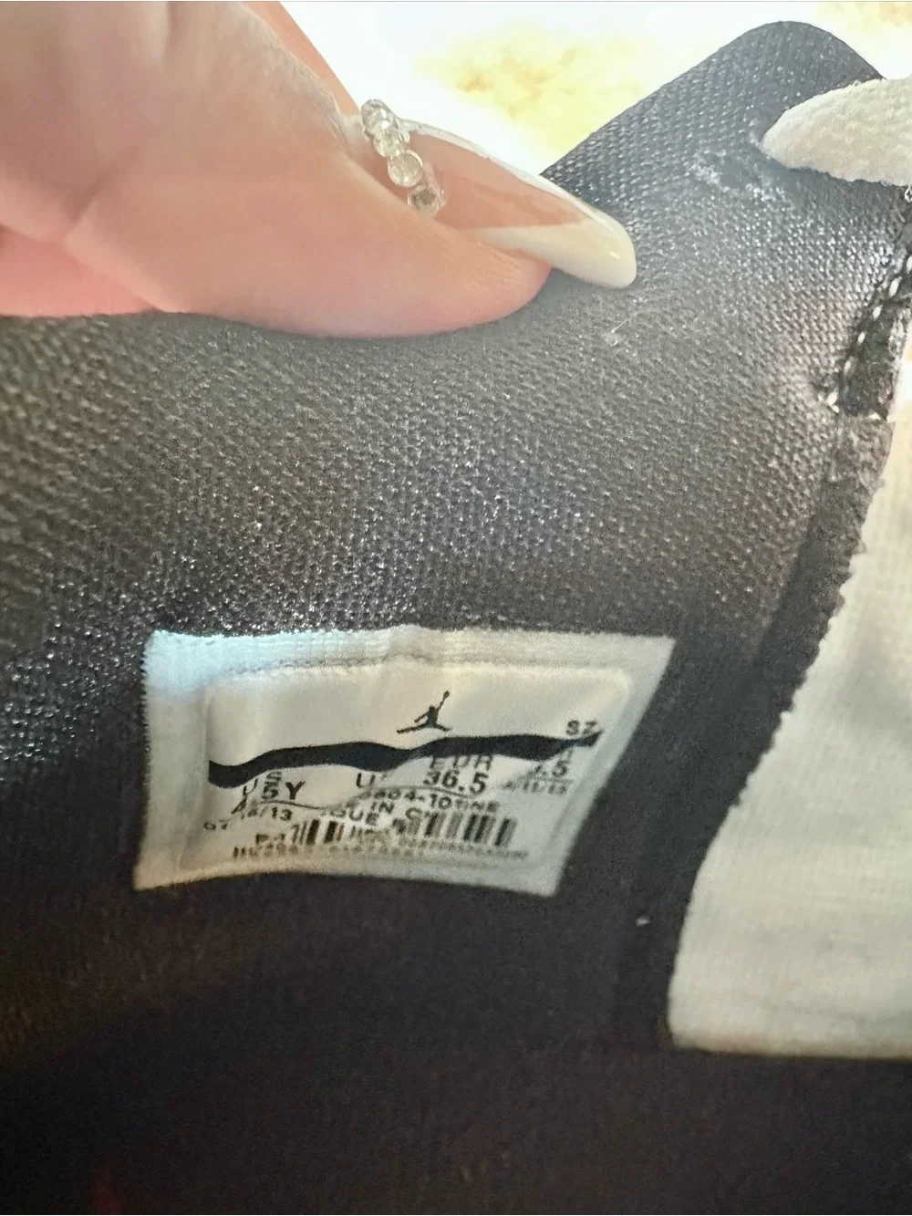 Jordan Son of Mars Low Basketball Sneakers in White, Black and Red Boy 4.5Y